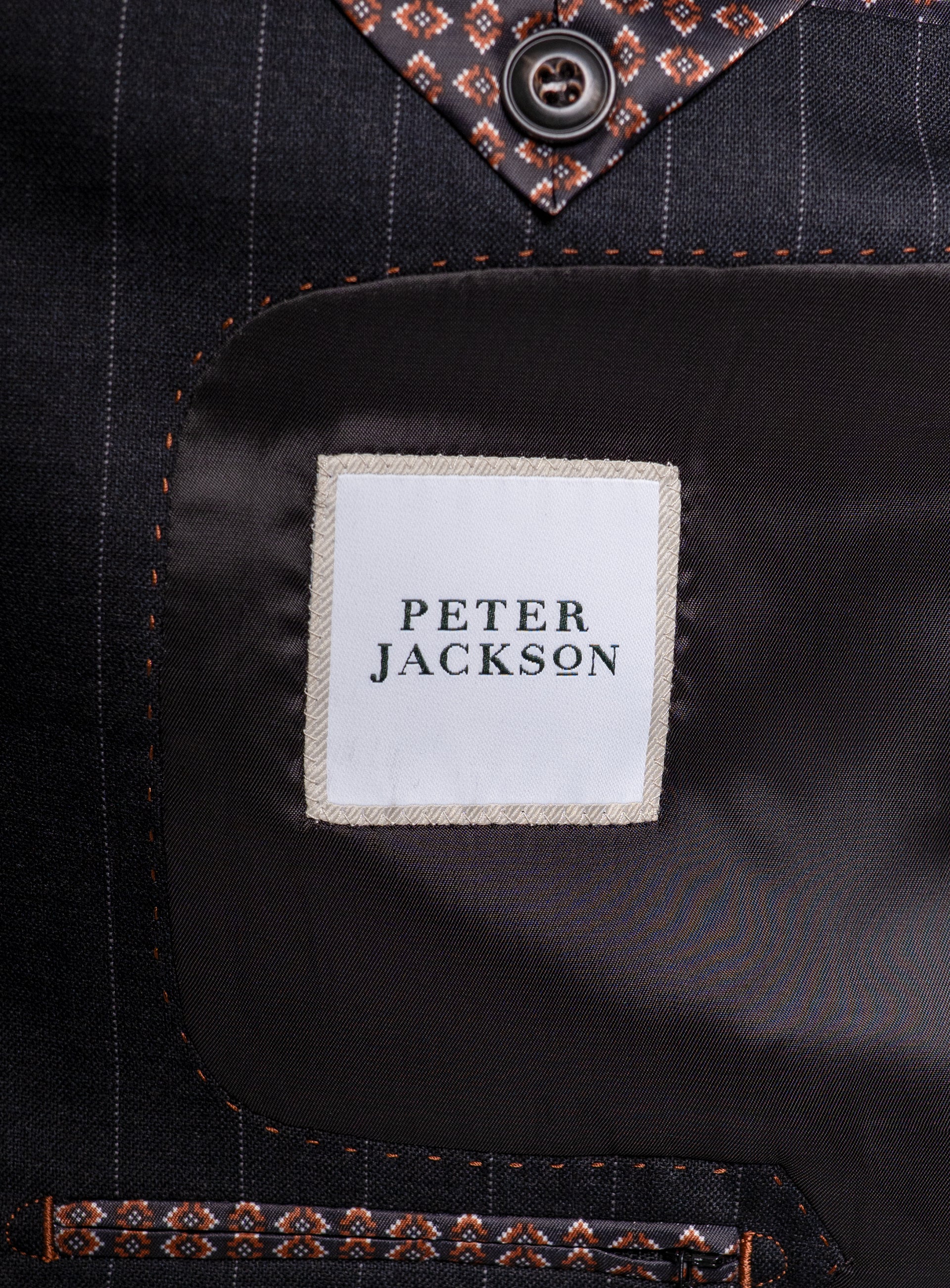 Picture of the "Peter Jackson" label on the Petruccio Charcoal Pinstripe Suit