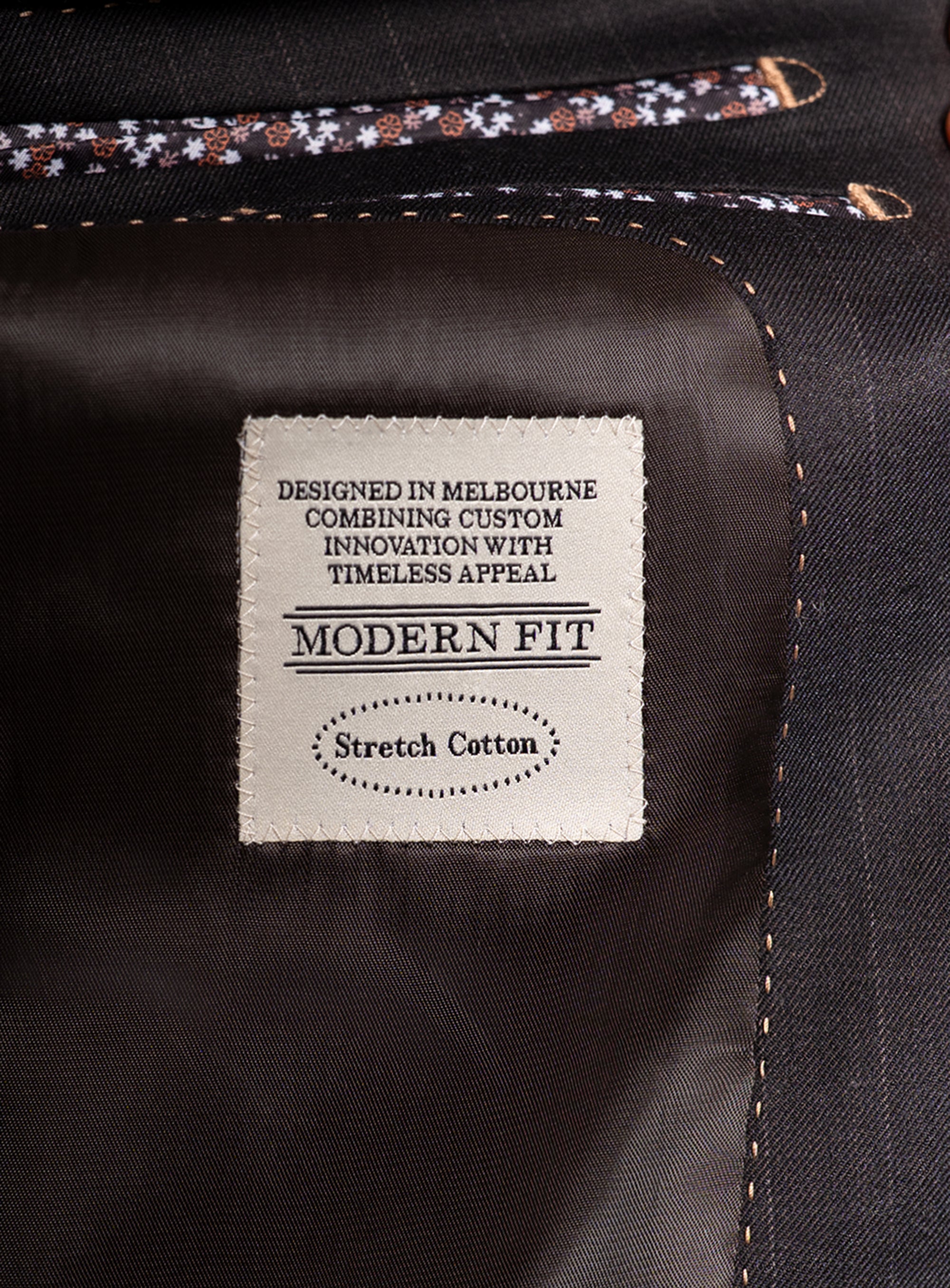 Label set against a dark fabric background.