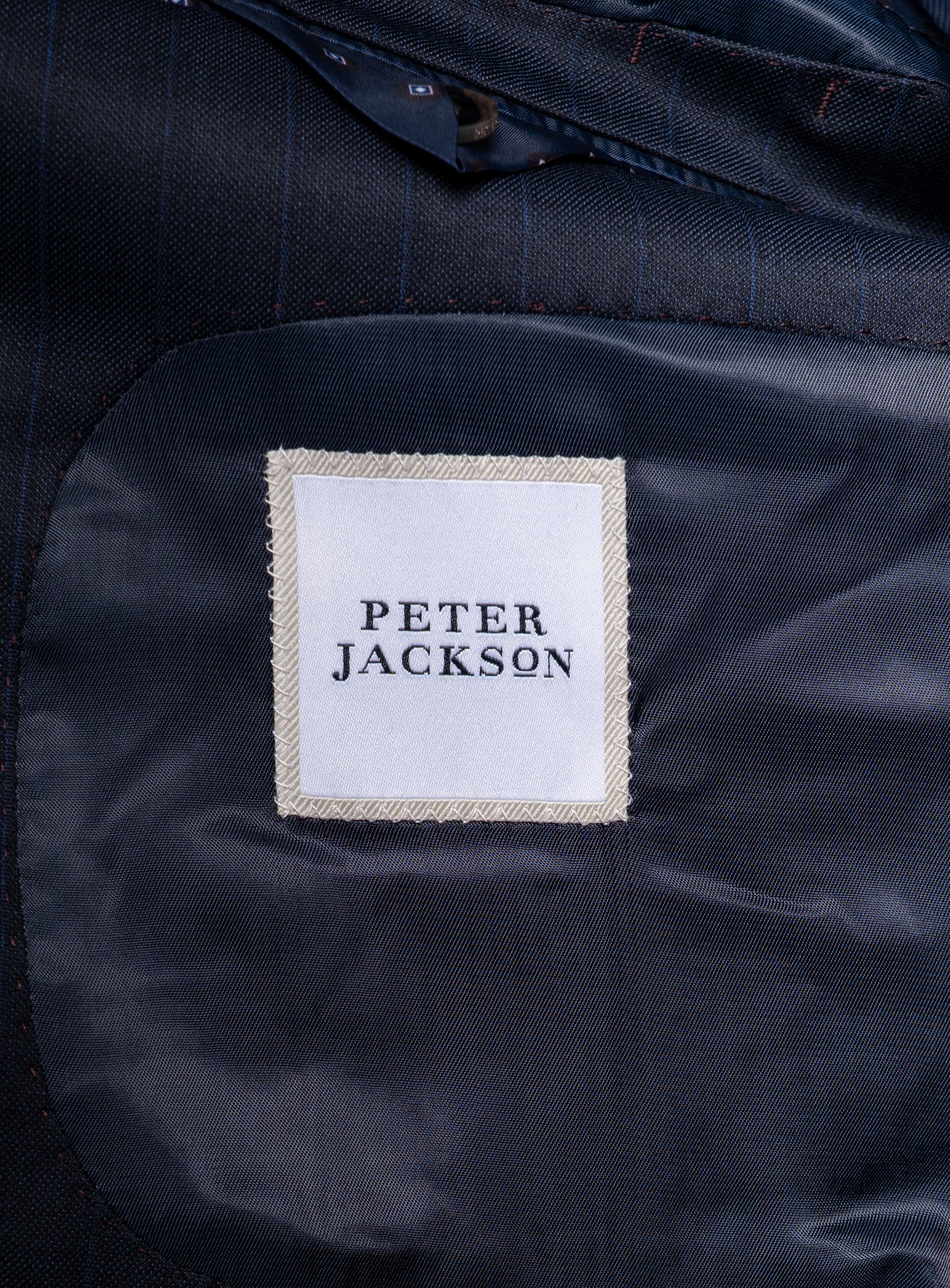 The "Peter Jackson" logo on the Laforeze Navy Pinstripe Suit