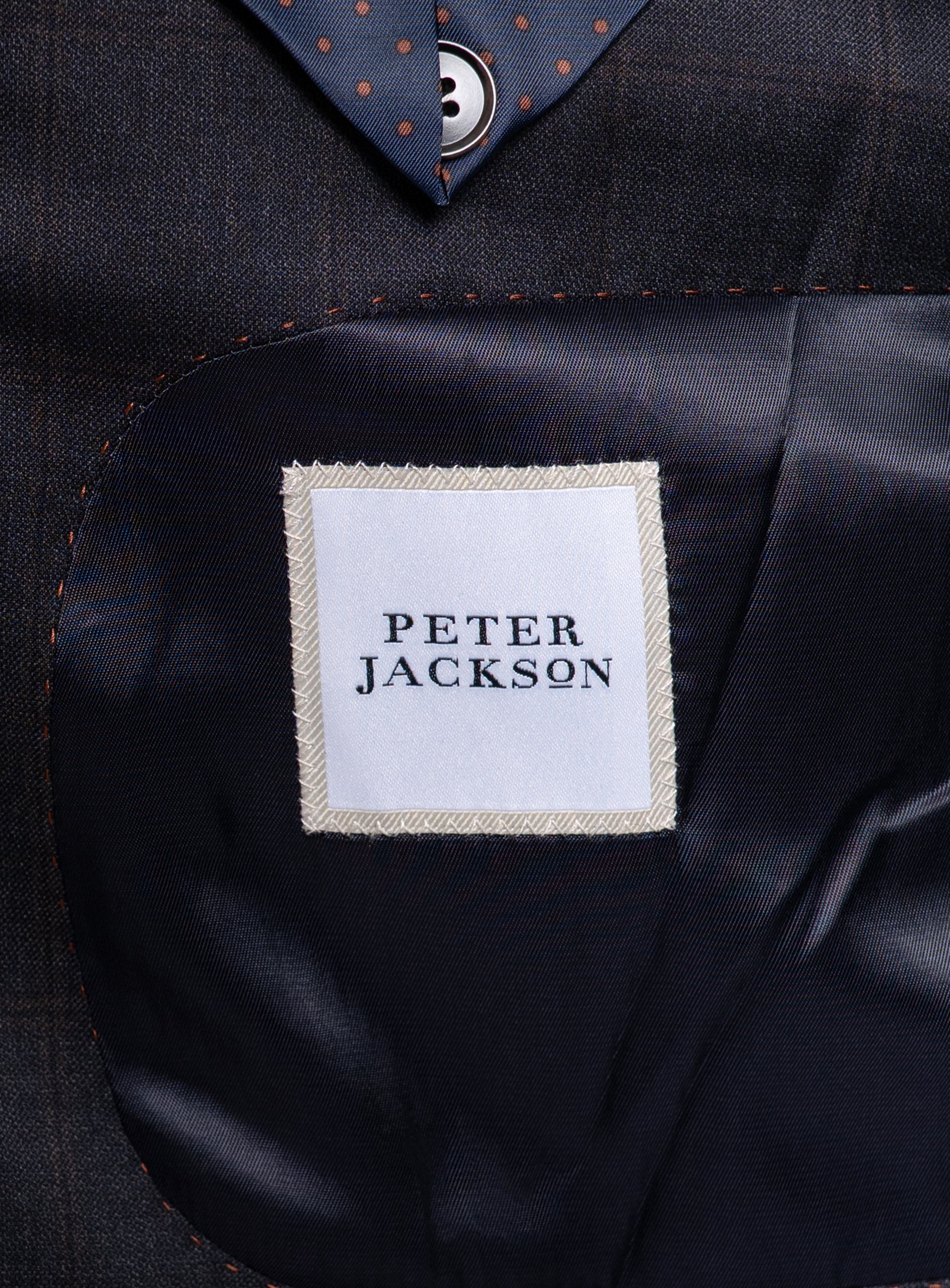 The Peter Jackson logo on the Volterra Navy Check Suit