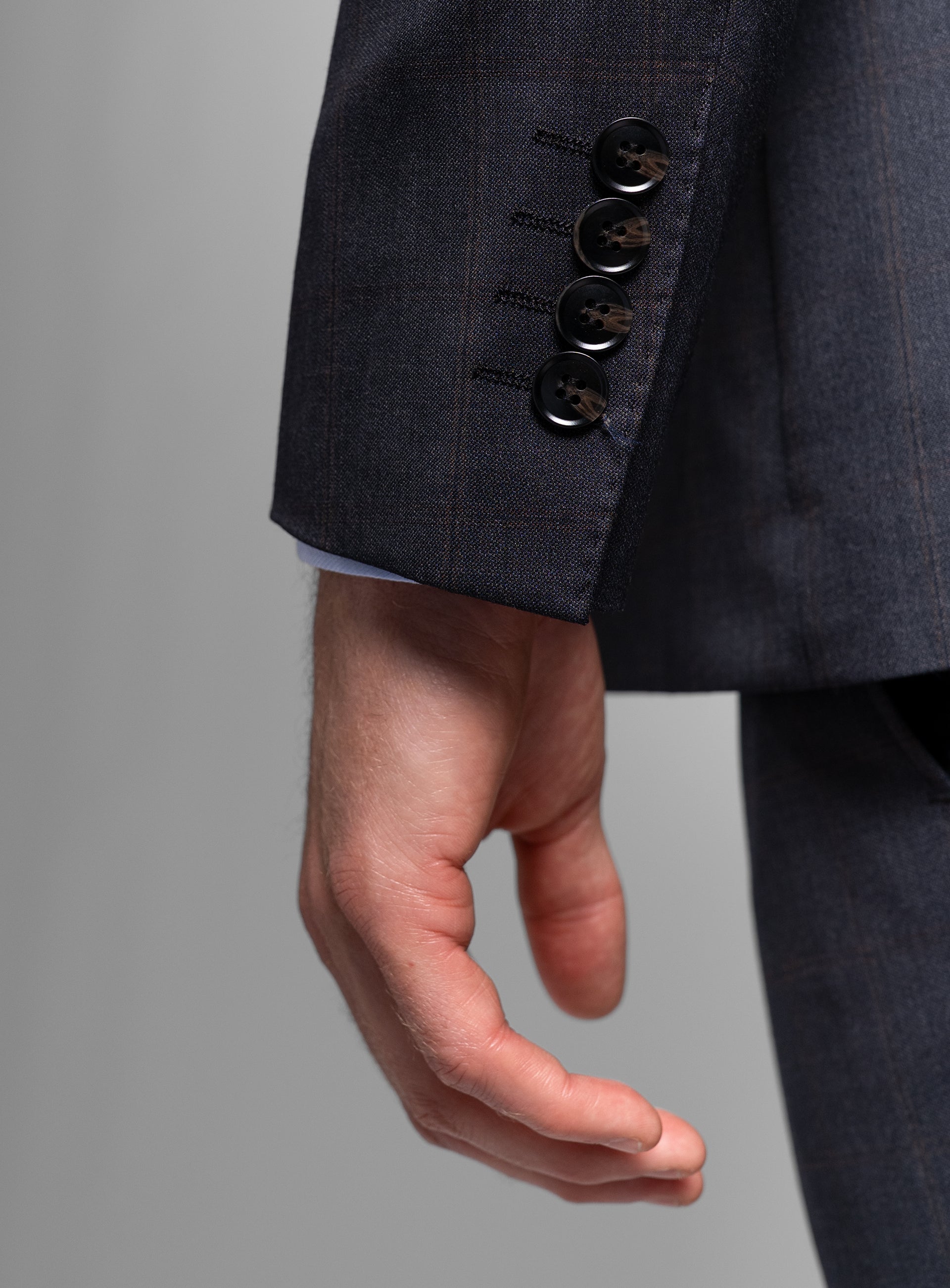 Close-up of the sleeves on the Volterra Navy Check Suit