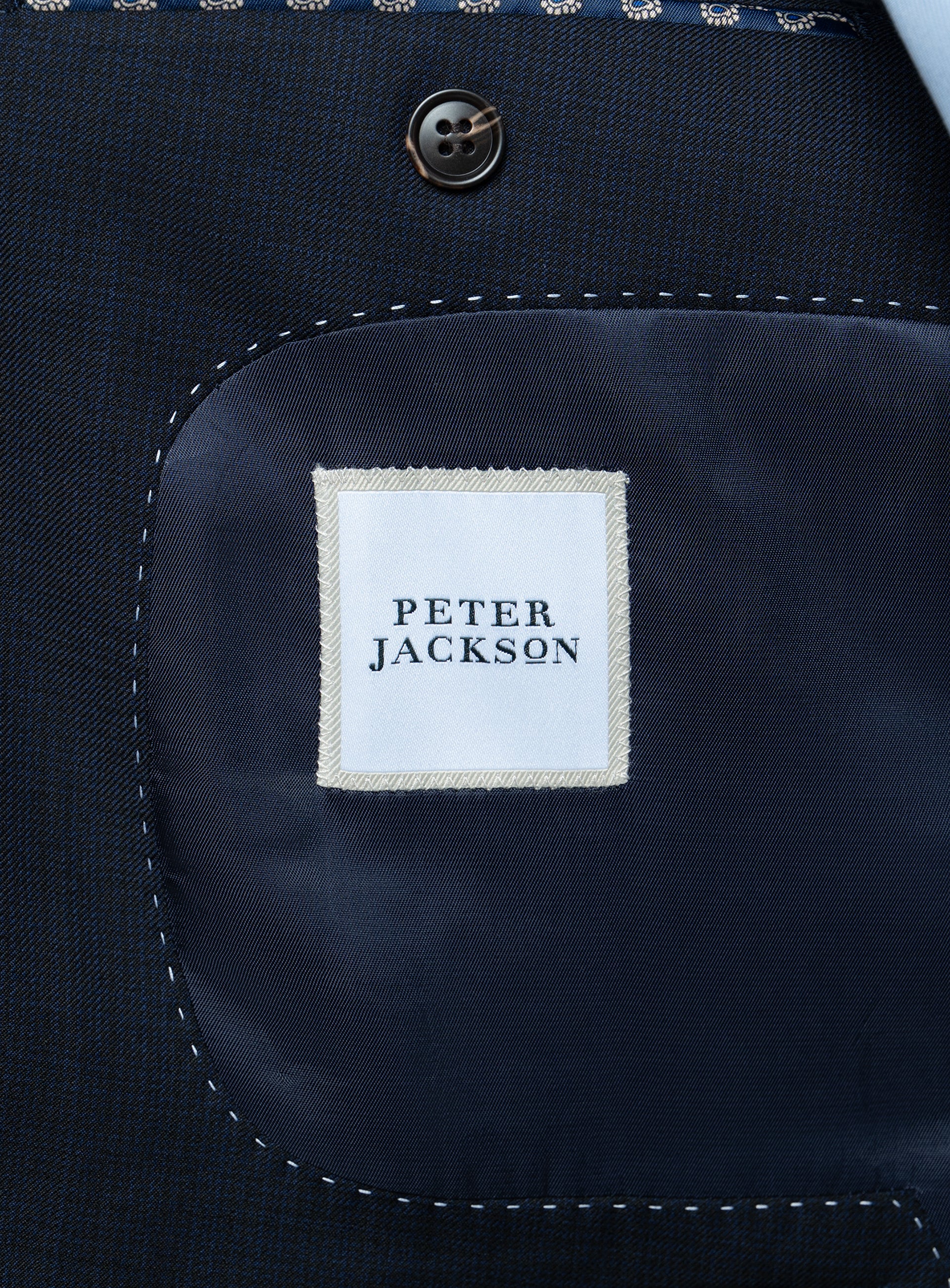 The "Peter Jackson" logo on the Vasquez Textured Navy Suit