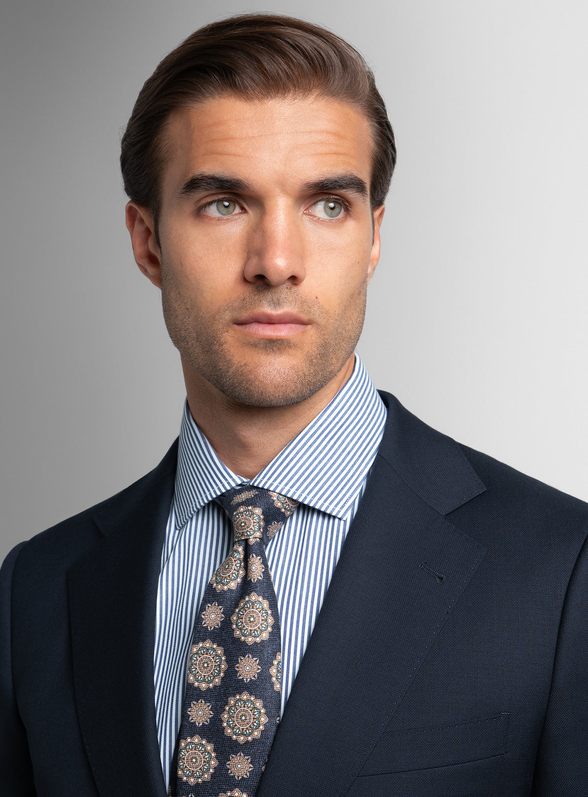 Close-up of a man wearing the Heras Basketweave Navy Suit