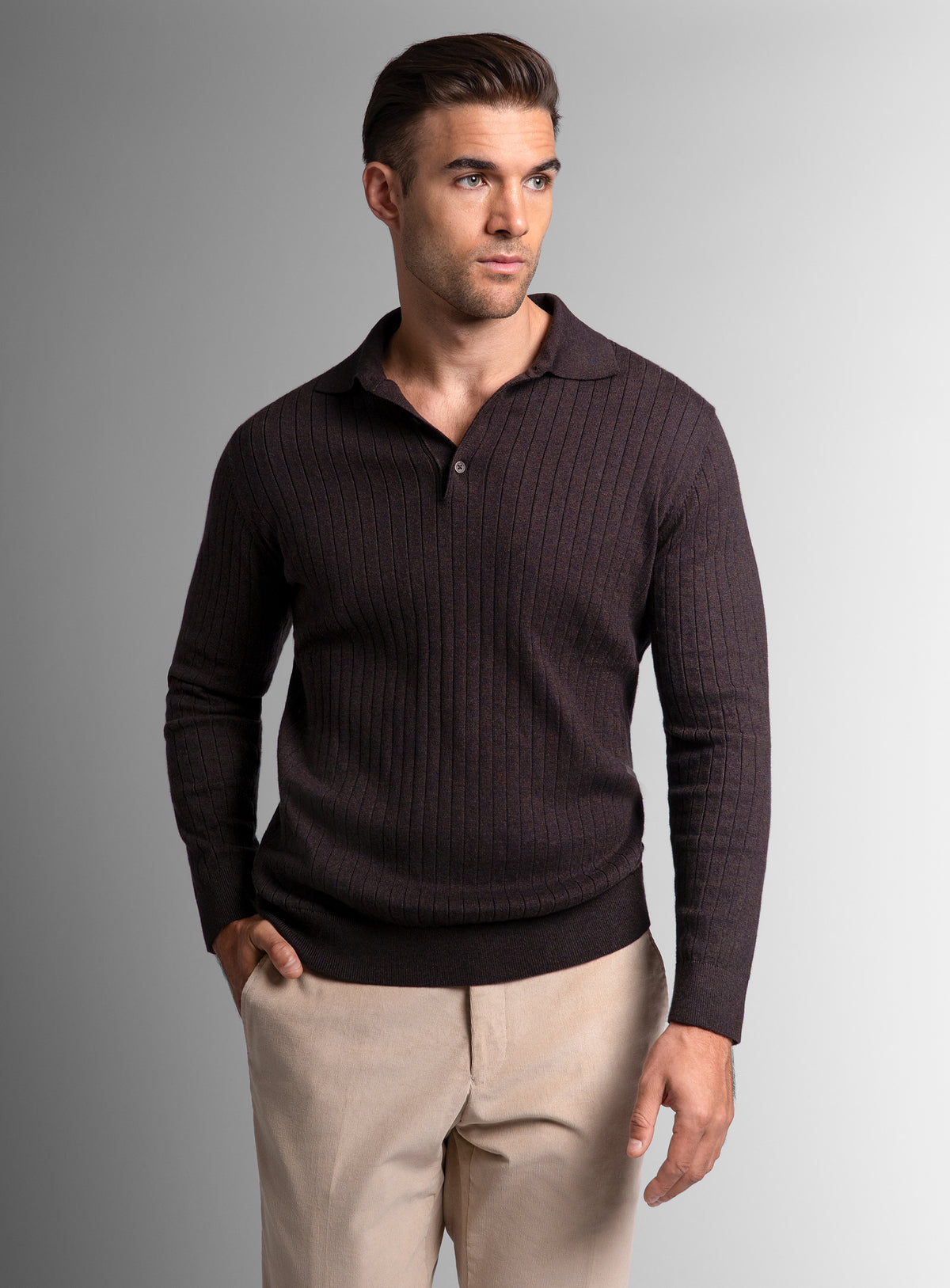 Man looking to his side wearing the Cotton/Cashmere Fine Rib Brown Polo Knit