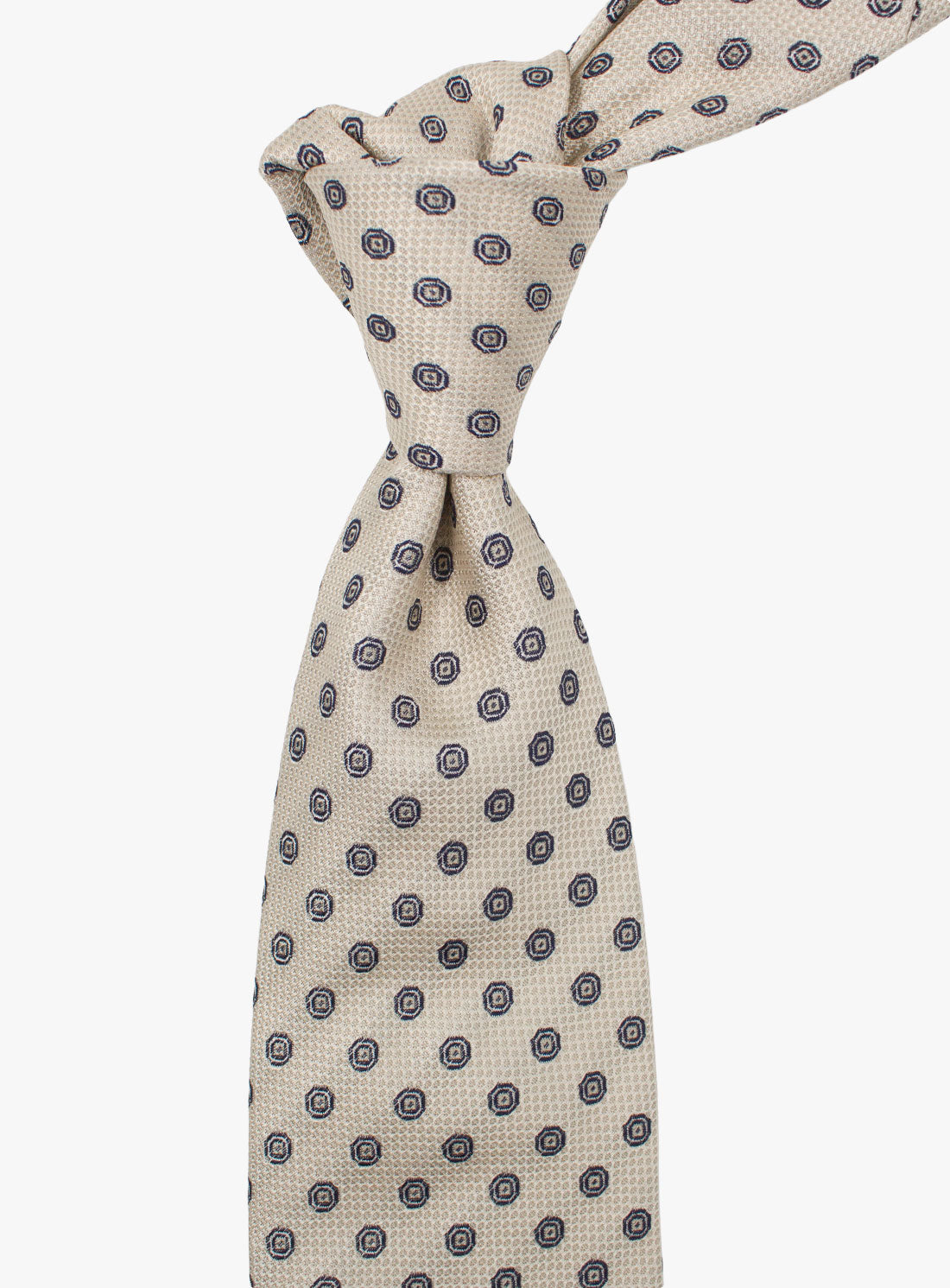 The Bottinelli Sabbia Medallion Beige Silk Tie tied up