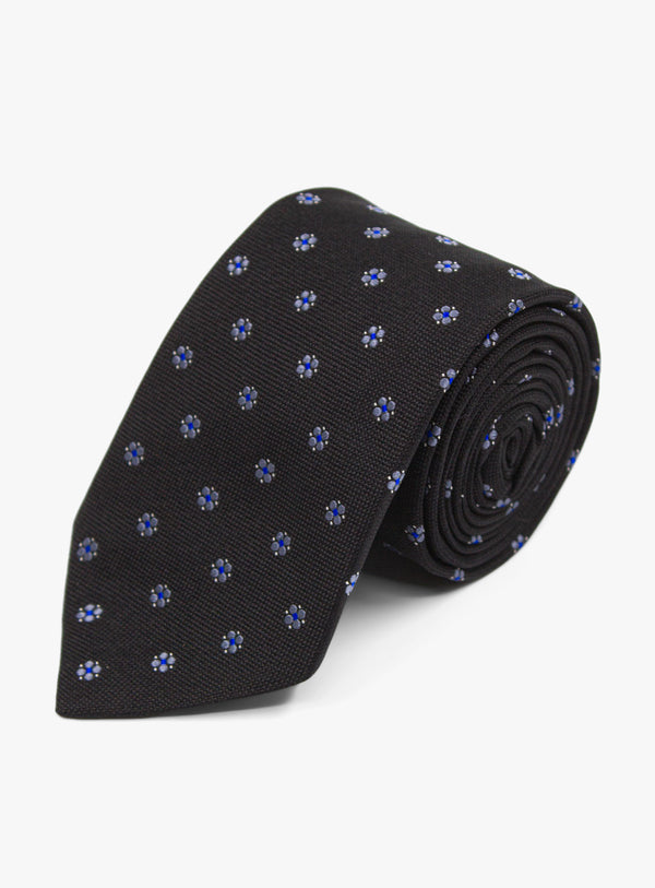 The Bottinelli Nero Fiore Black Silk Tie rolled up