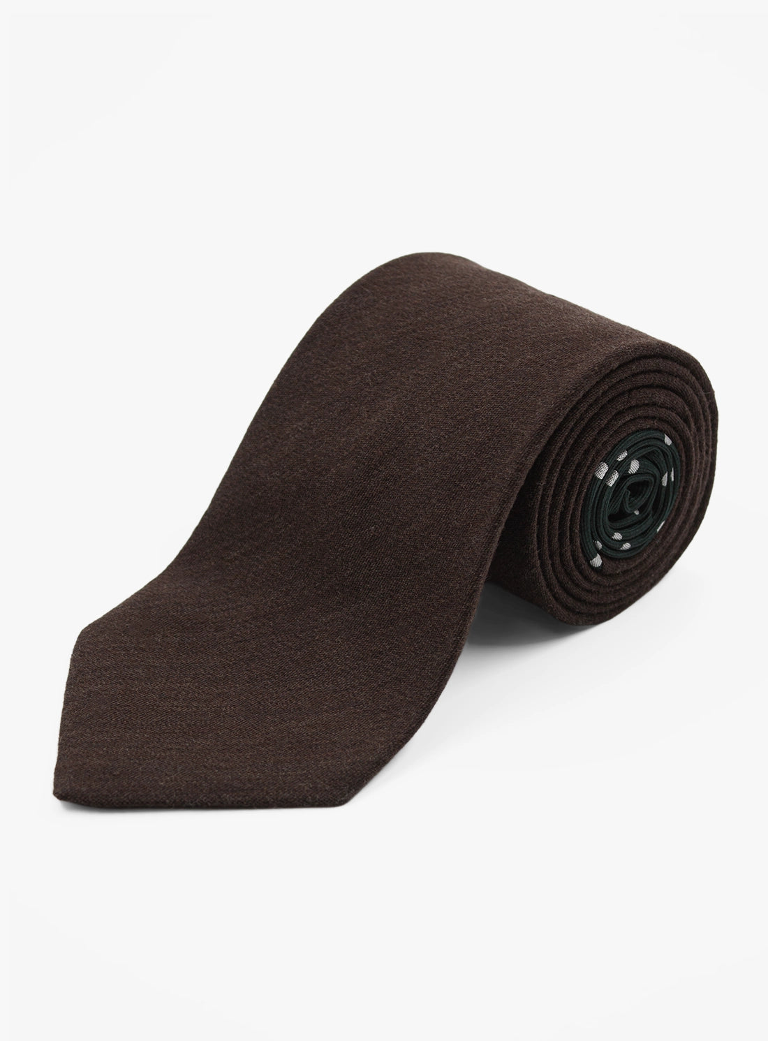 Brown tie rolled up on a white background