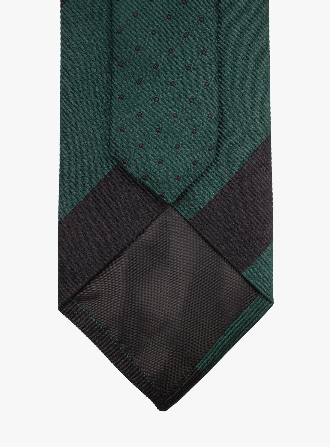 Green and black patterned tie on a white background