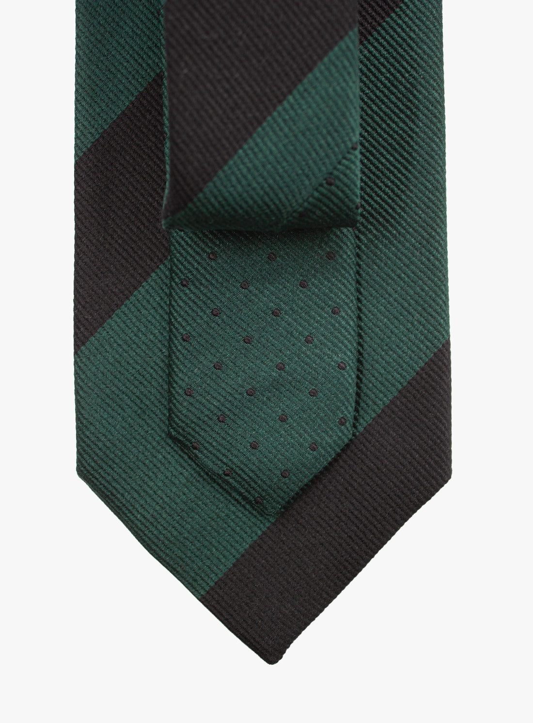 Green and black checkered tie with a pocket square on a white background