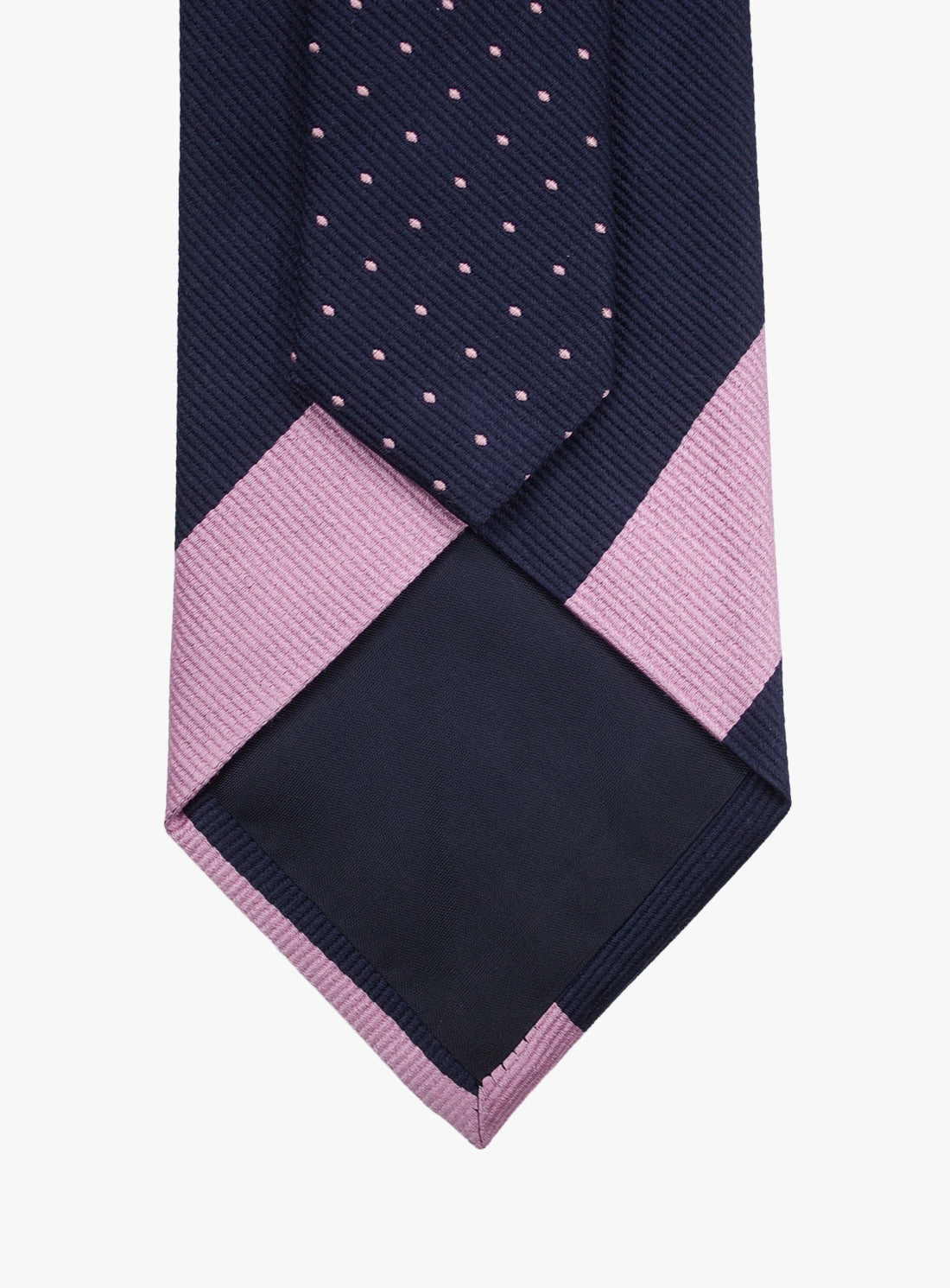 Navy tie with pink diamond pattern on a white background