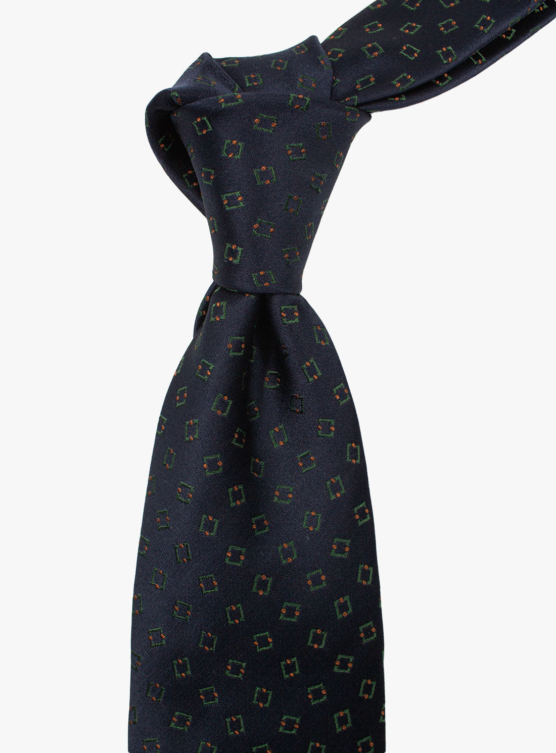 The Bottinelli Bosco Geo Navy Silk Tie tied up