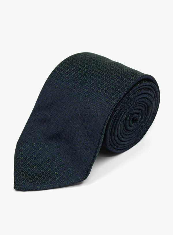 The Bottinelli Notte Verde Navy Silk Tie rolled up