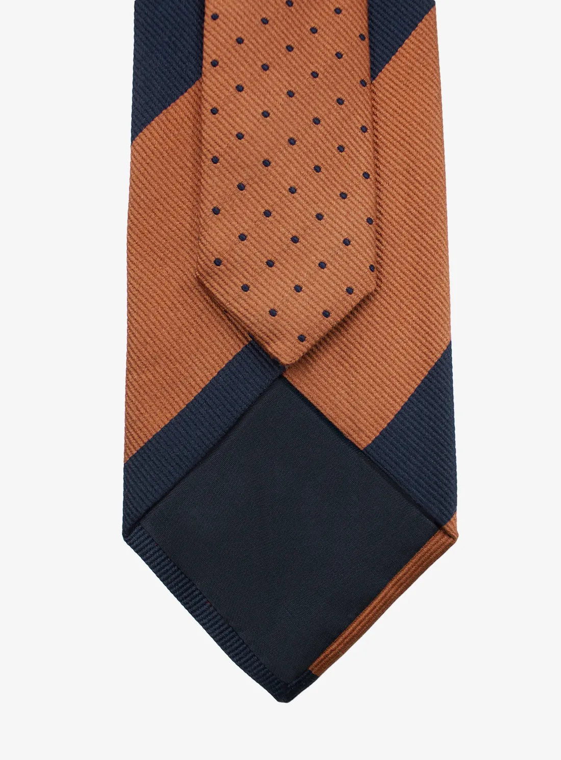 Navy and brown patterned tie on a white background