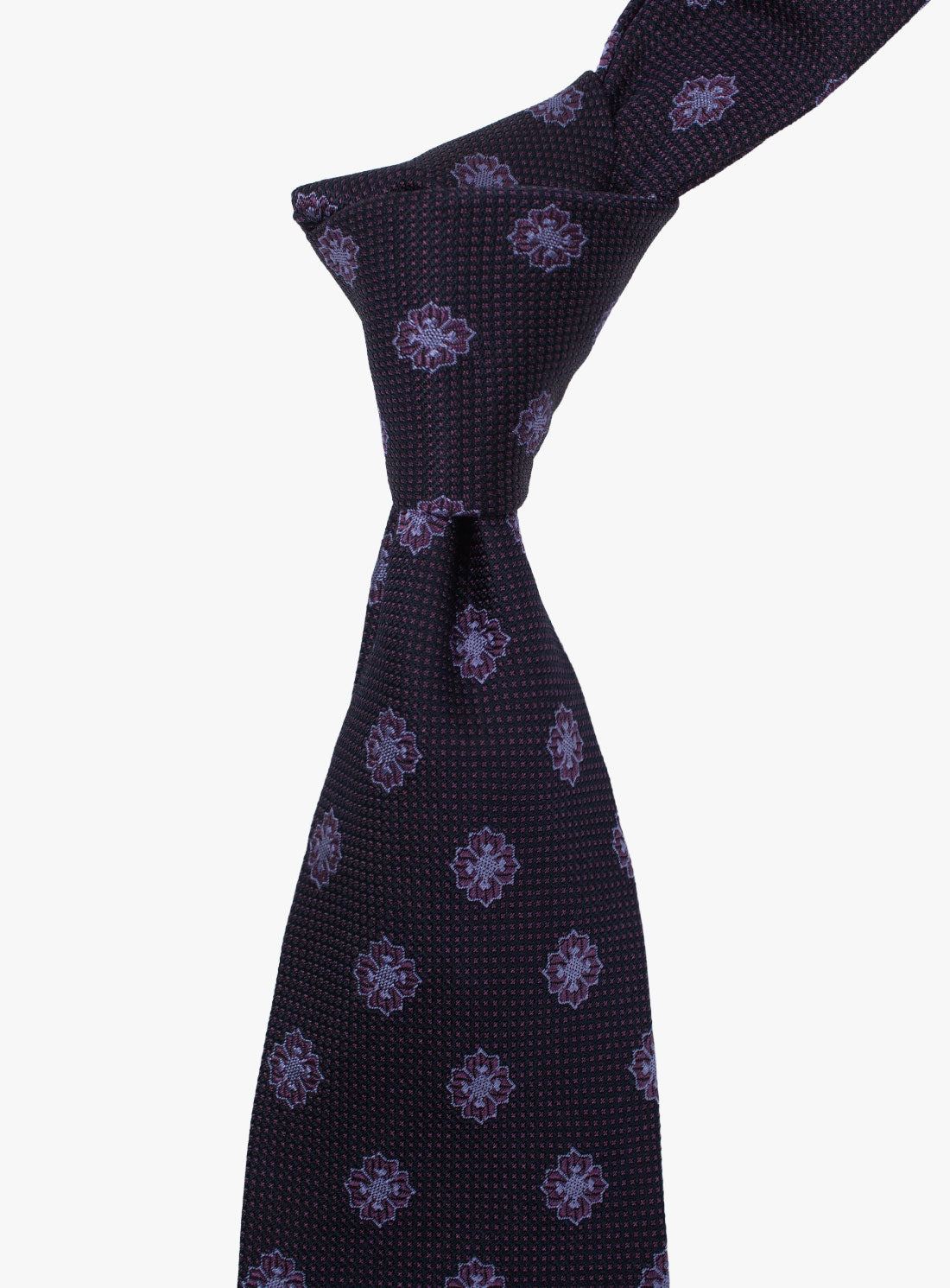 The Bottinelli Viola Medallion Plum Silk Tie when tied up
