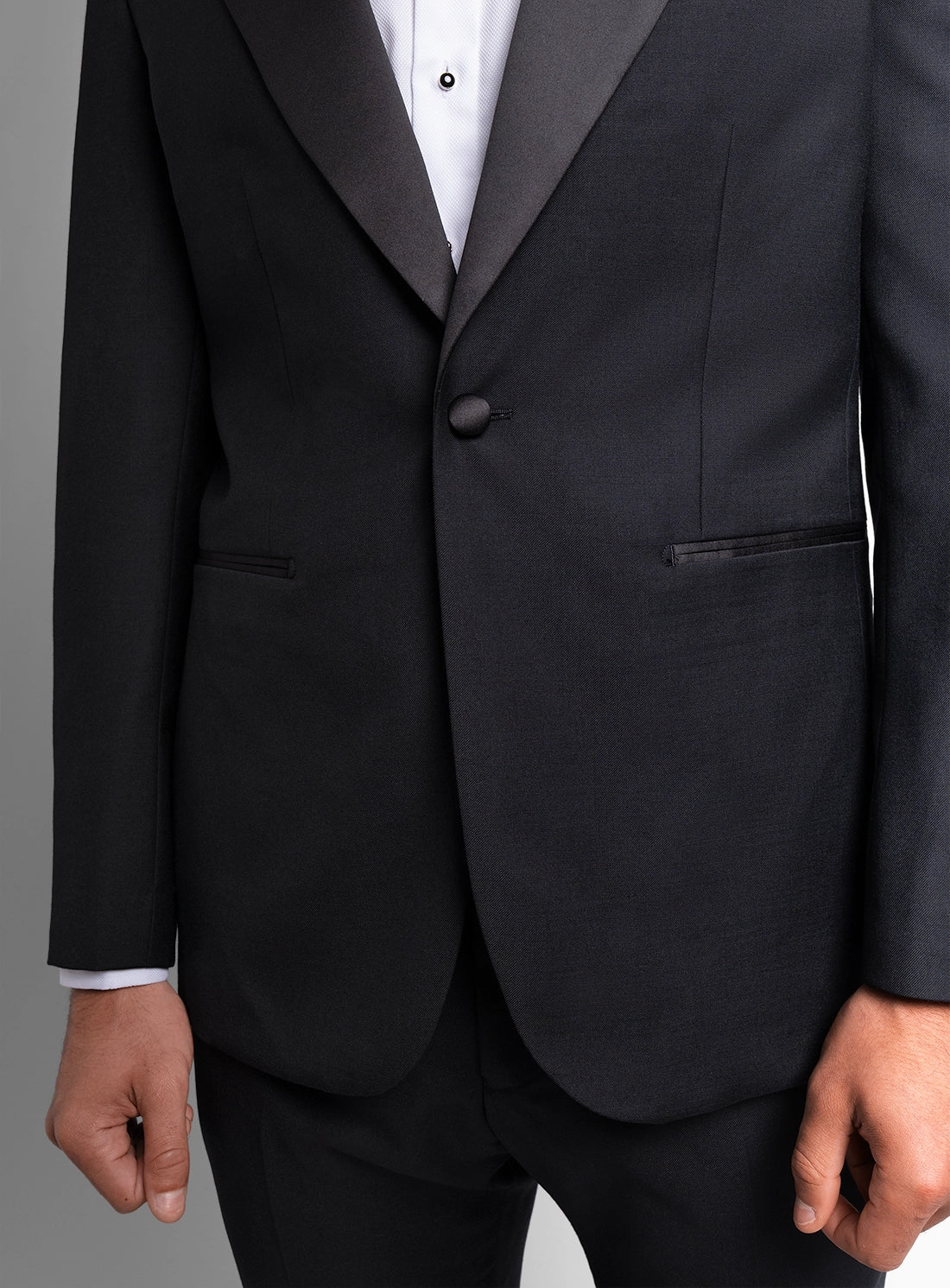 Black suit jacket on a gray background