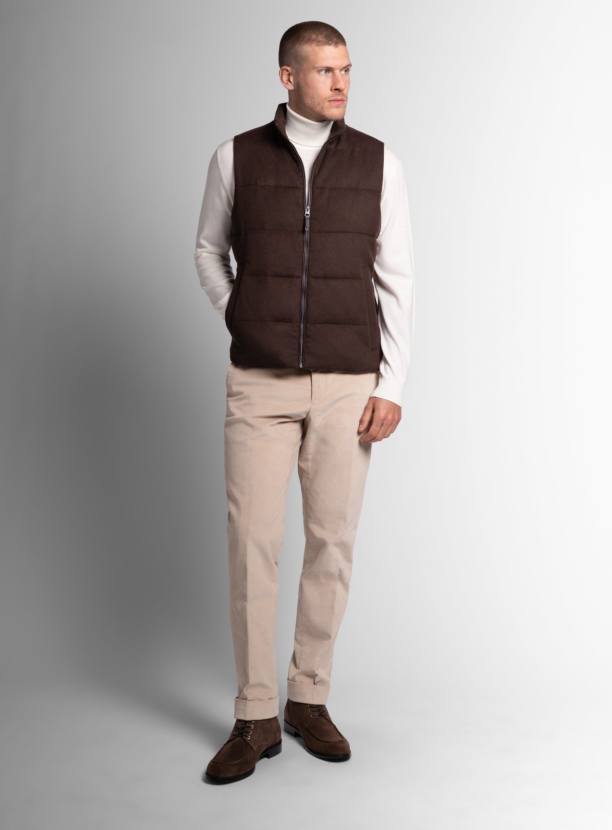 Man wearing the Gandolfi Wool Pile Brown Puffer Vest with his hand in his pocket