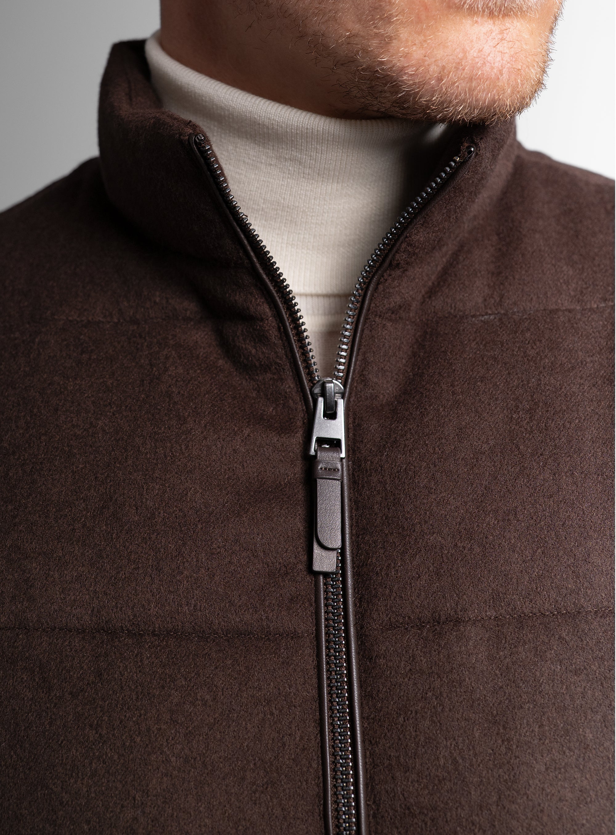 Close-up of the zipper on the Gandolfi Wool Pile Brown Puffer Vest