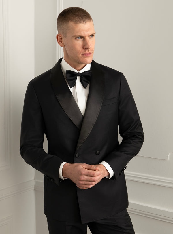 Rossini Black Dinner Jacket - Model front view with hands clasped