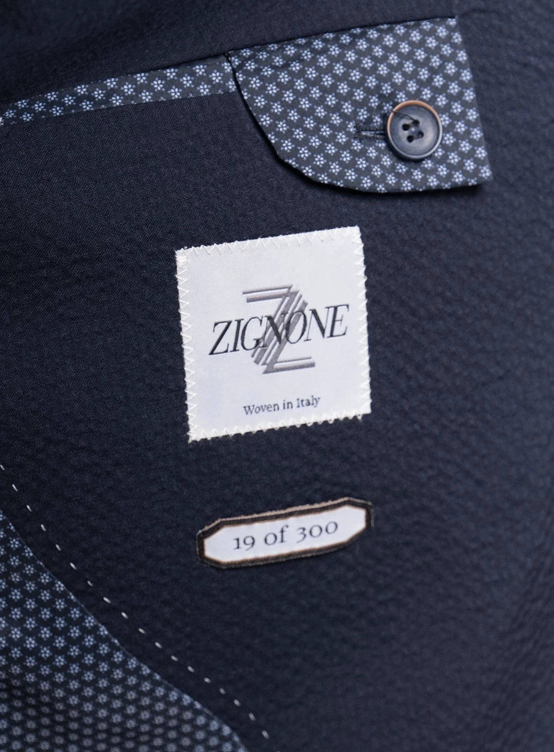 Navy fabric with a Zig Zone label and button detail