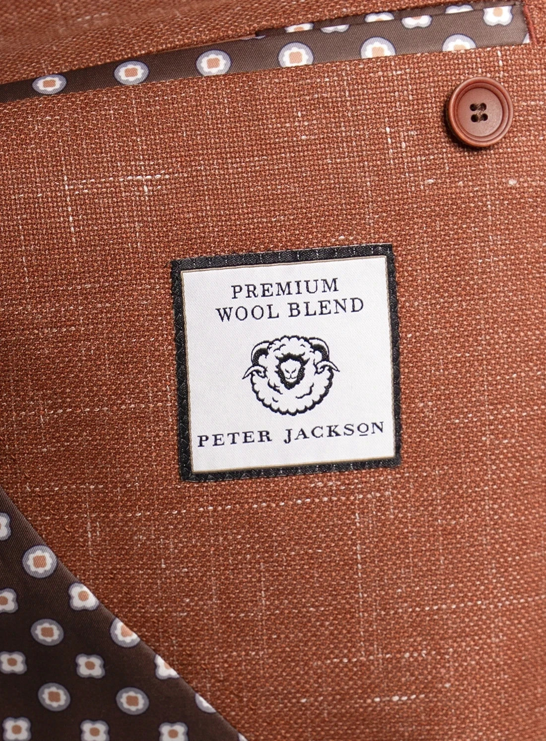 Brown fabric with a 'Peter Jackson' label indicating premium wool blend.