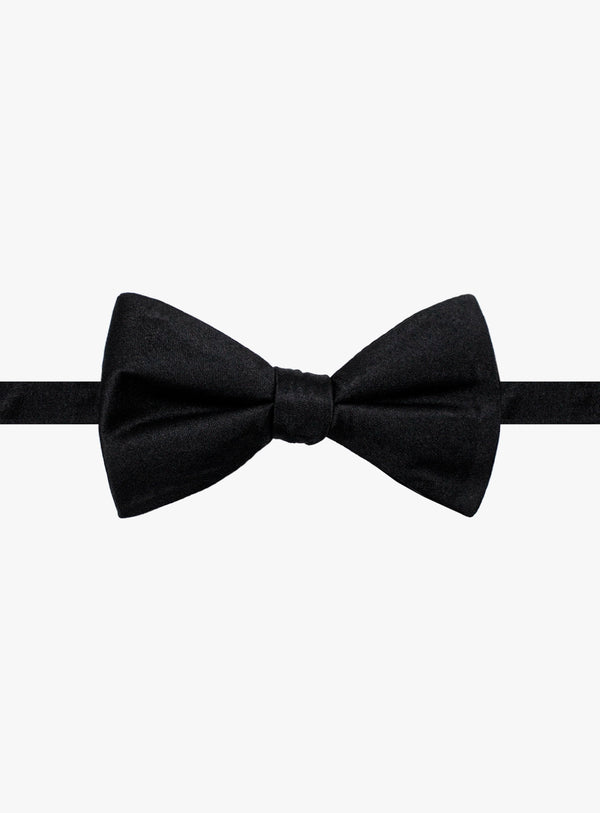 Black bow tie on a white background