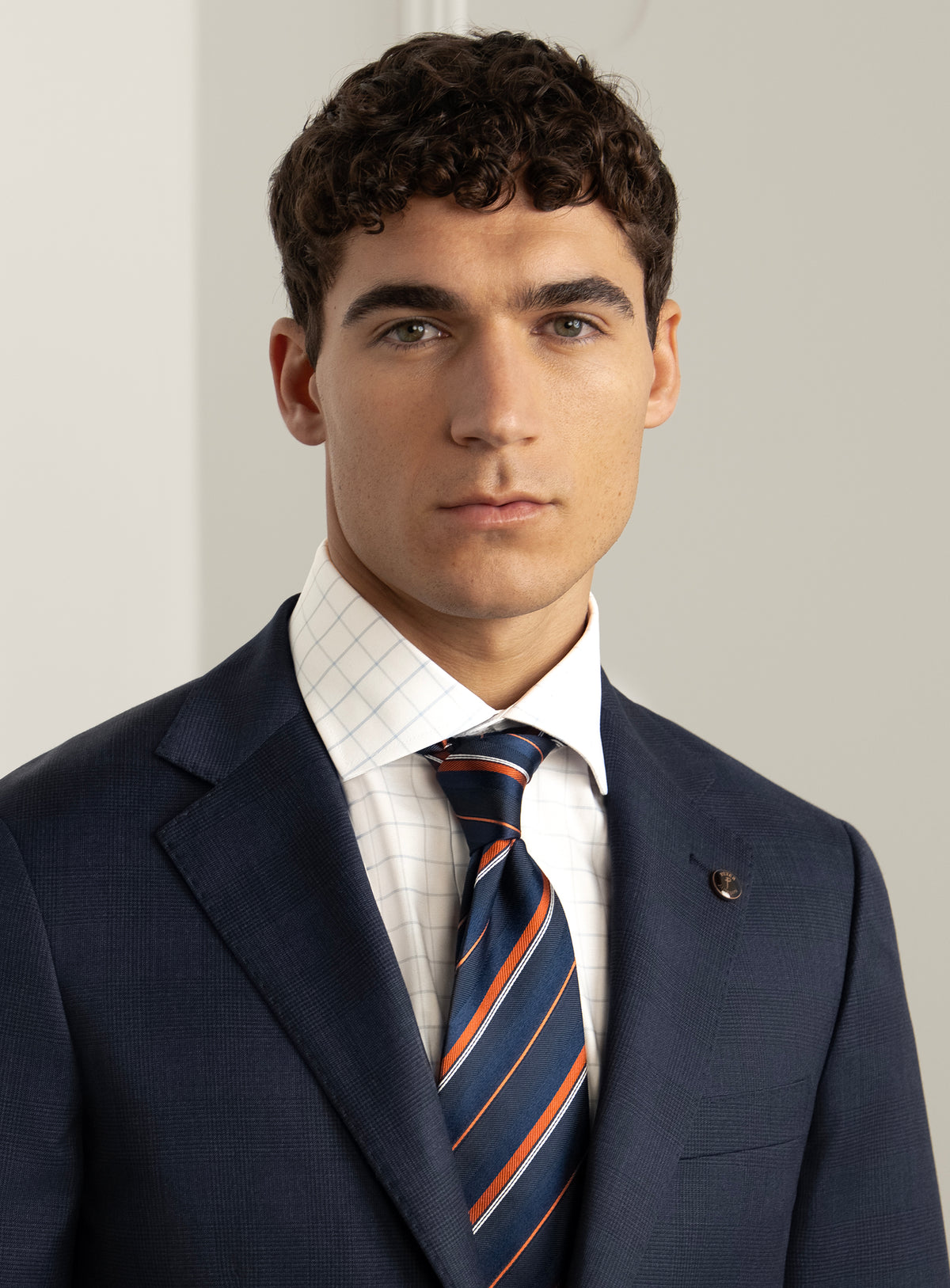 Pazzi Plaid Navy Suit - Lapel and upper-body portrait