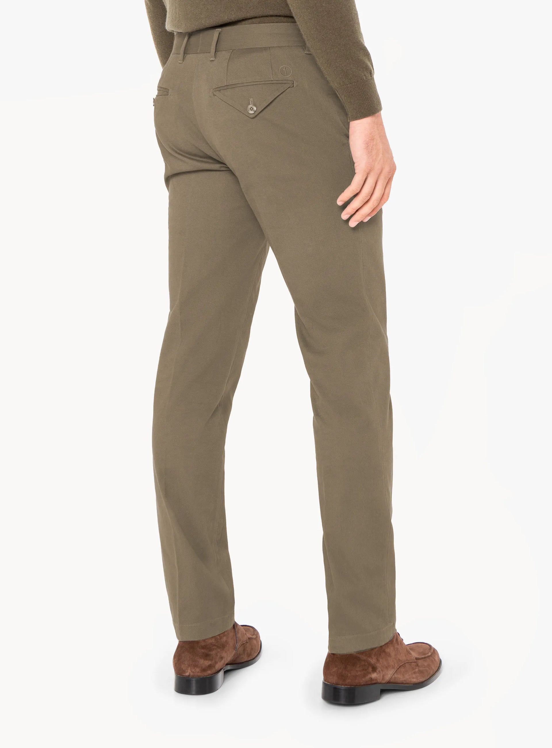 Khaki pants worn by a person on a white background