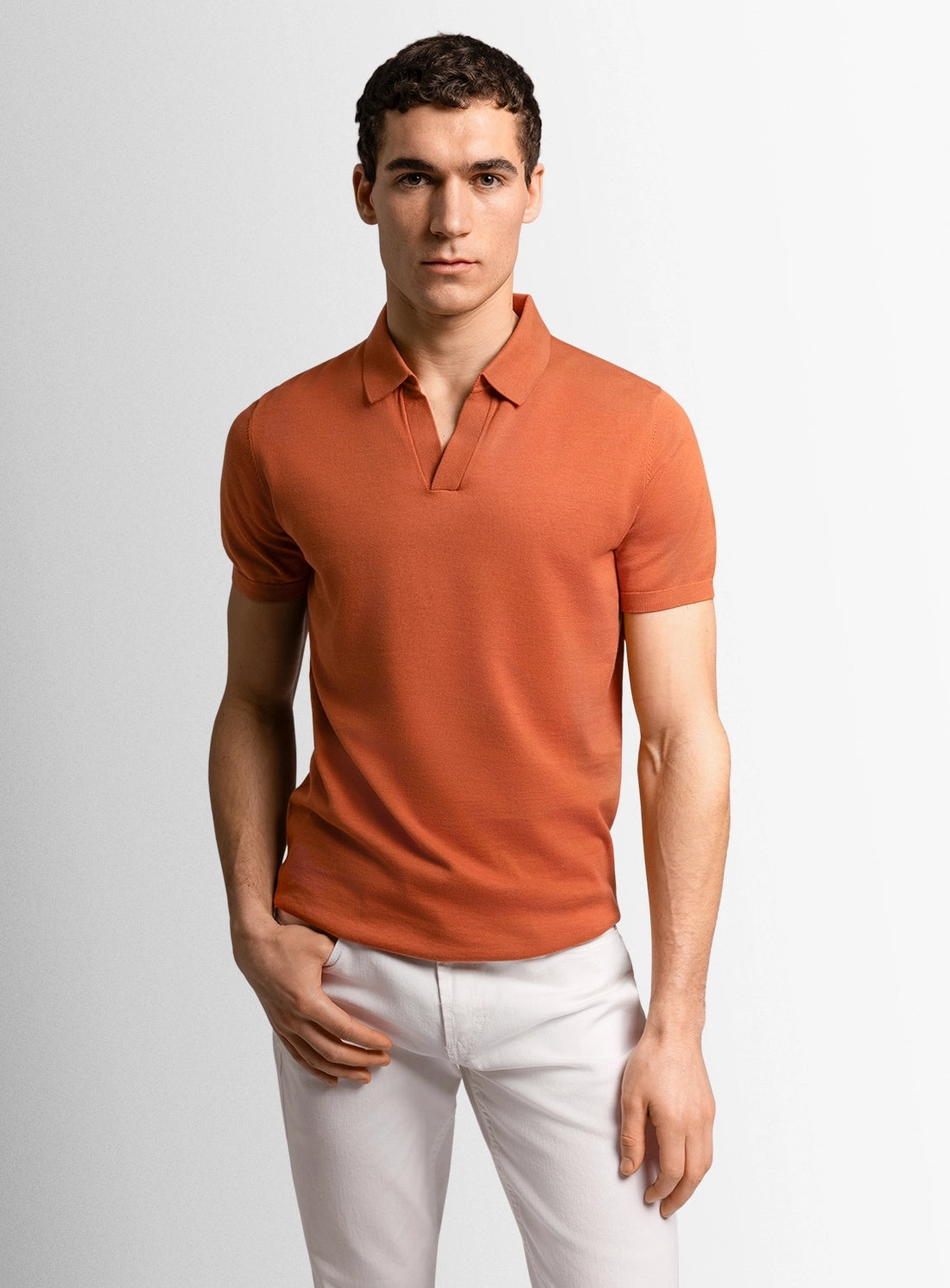 Orange dress shirt with a Peter Jackson label on a white background