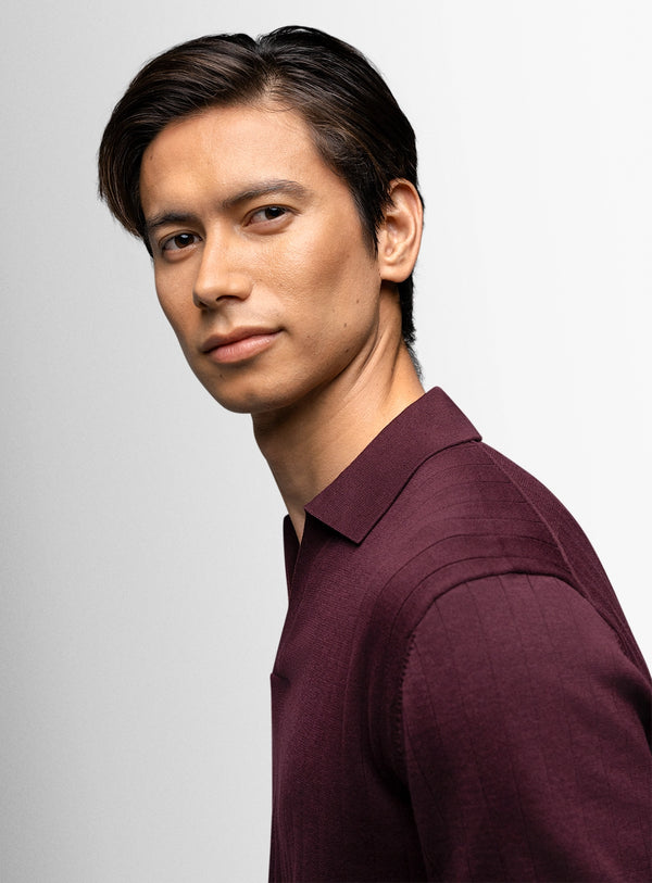 Man wearing red polo shirt