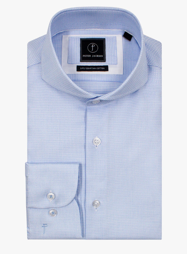 Light blue checkered dress shirt with a brand label on a white background