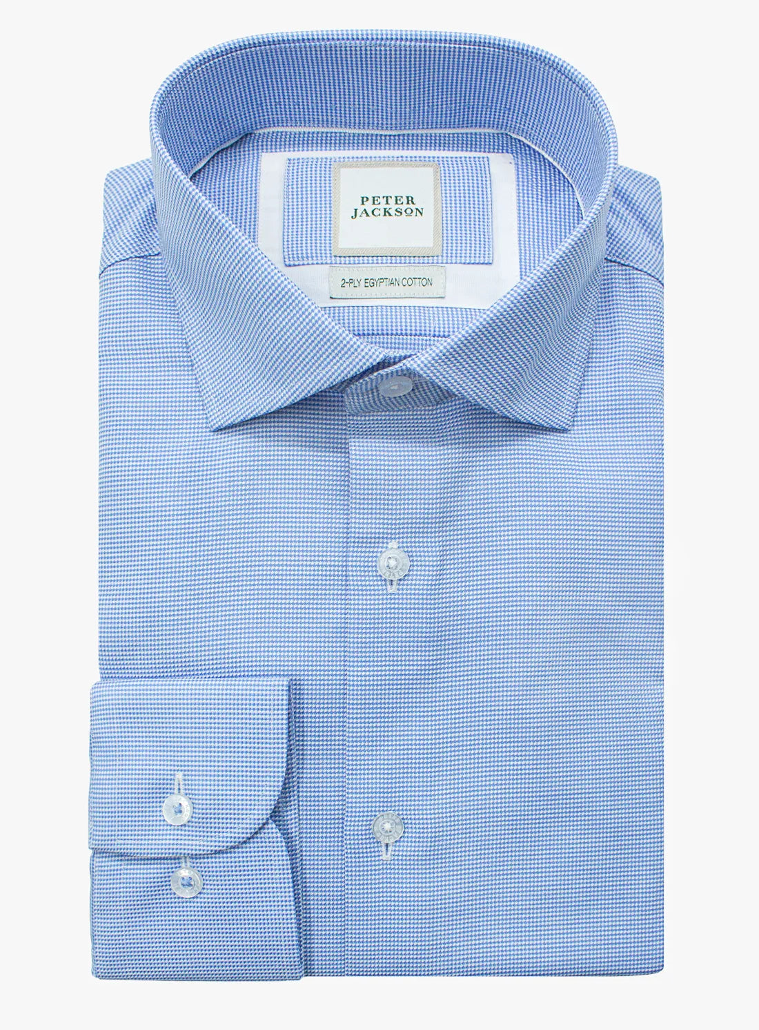 Blue dress shirt with a Peter Jackson label on a white background