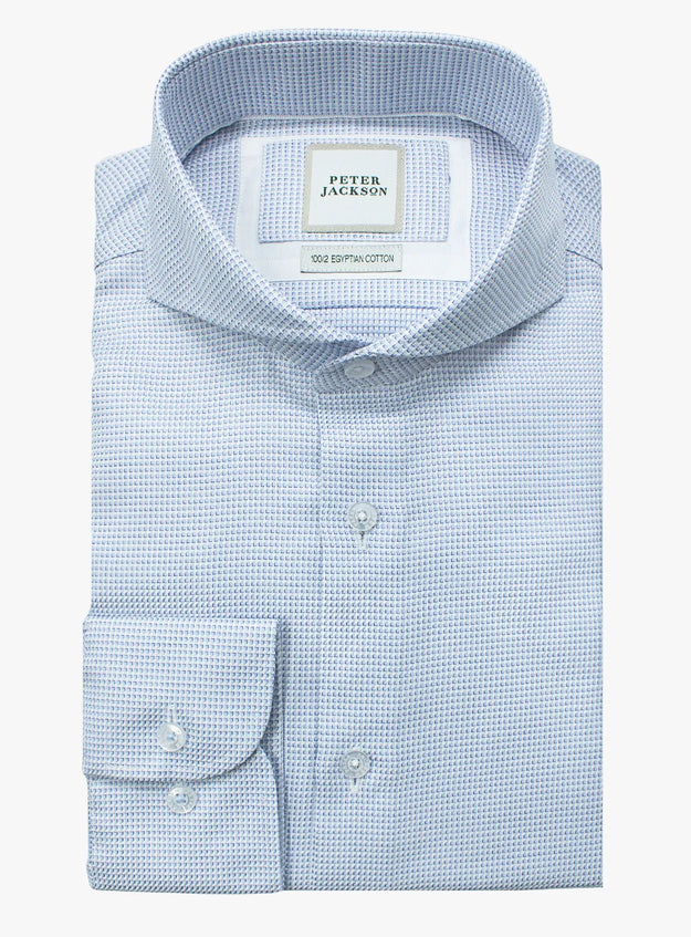 Pink dress shirt with a Peter Jackson label on a white background
