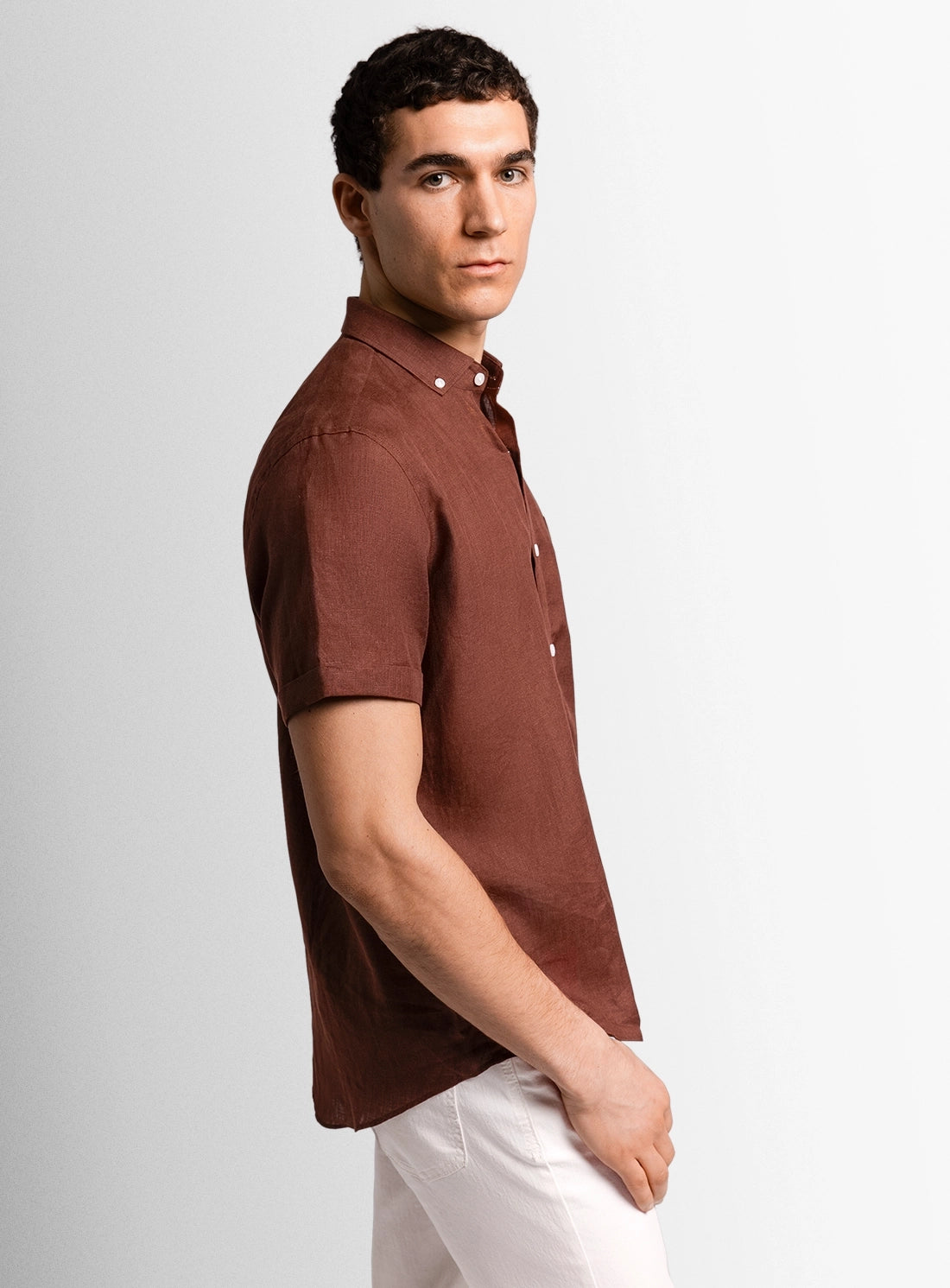 Brown dress shirt with a Peter Jackson label on a white background