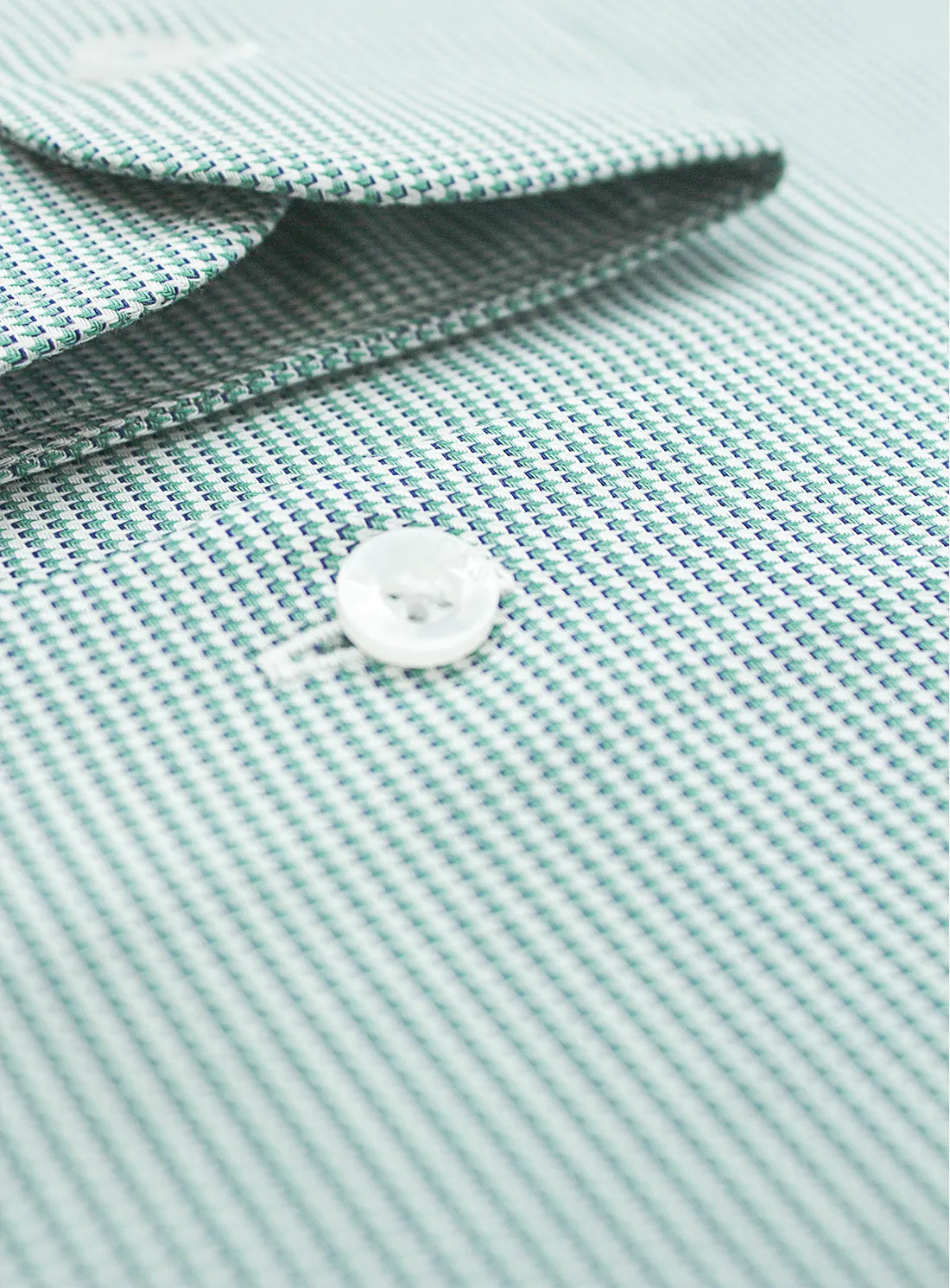 Green dress shirt with a Peter Jackson label on a white background