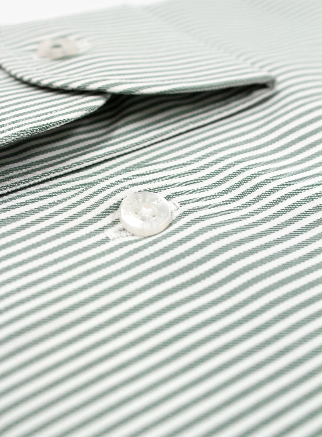 Close-up of a striped shirt with buttons