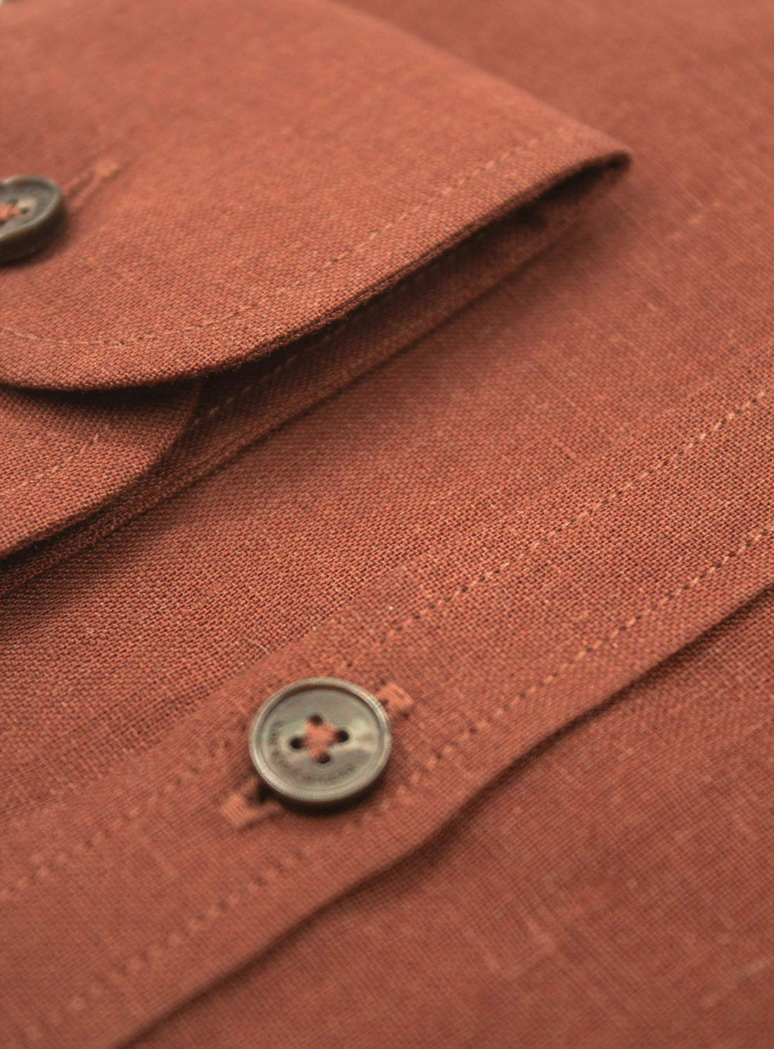 Close-up of a brown fabric with buttons