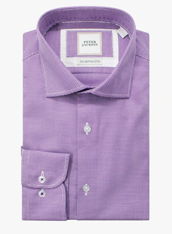 Purple checkered dress shirt with brand label on a white background