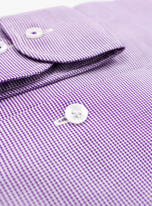 Close-up of a purple checkered shirt with buttons