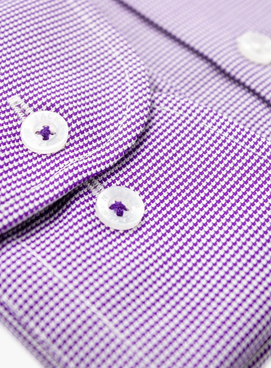 Close-up of a purple checkered shirt with white buttons