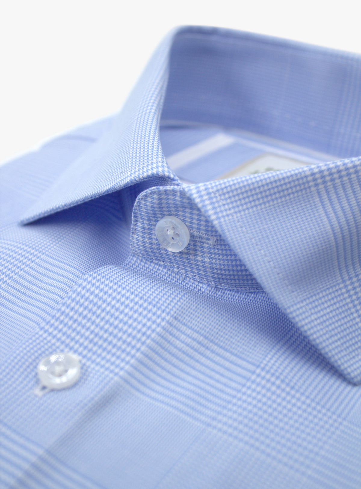 Cutaway collar and upper buttons of the Milan Oversize Plaid Sky Blue Shirt