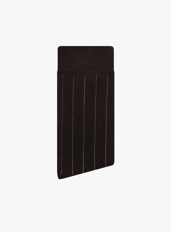 Black pleated fabric on a white background