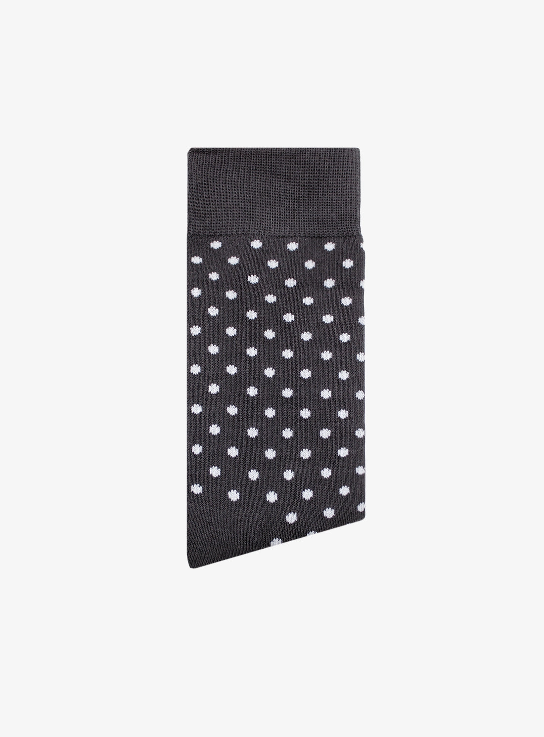 Black sock with white polka dots on a white background