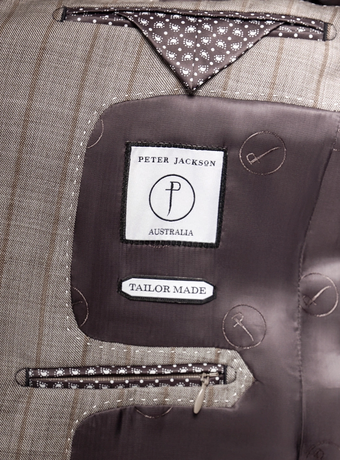 Close-up of a suit with a 'Peter Jackson Australia' label on the lining.