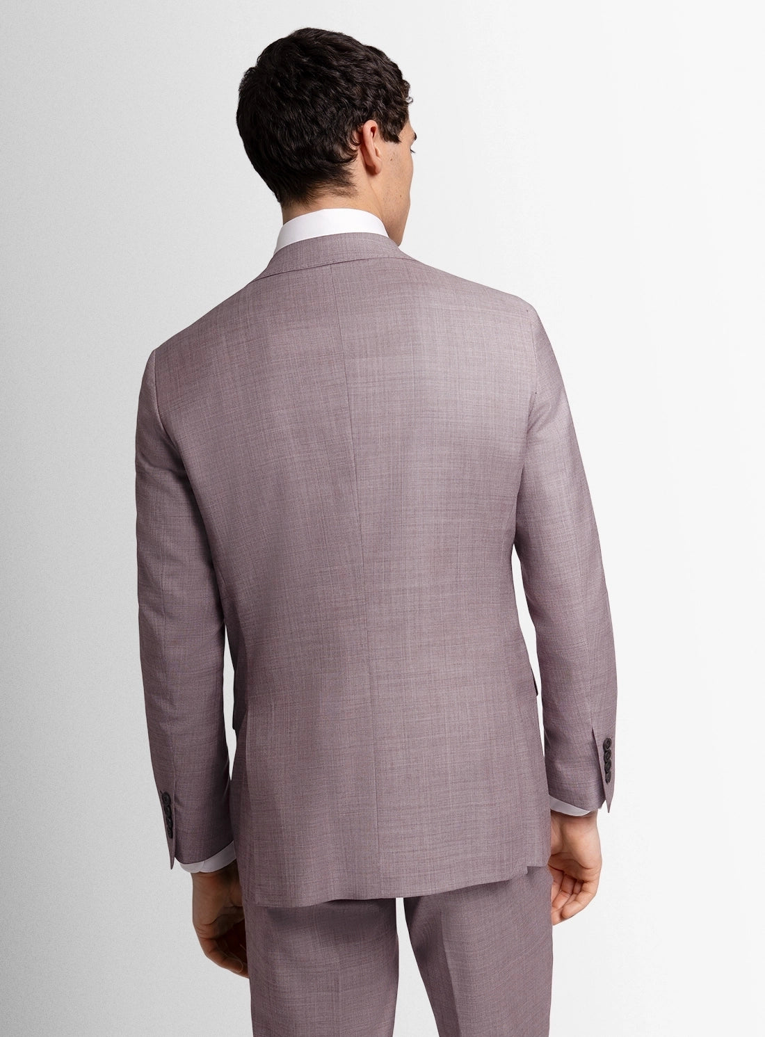 Man wearing a gray suit on a white background