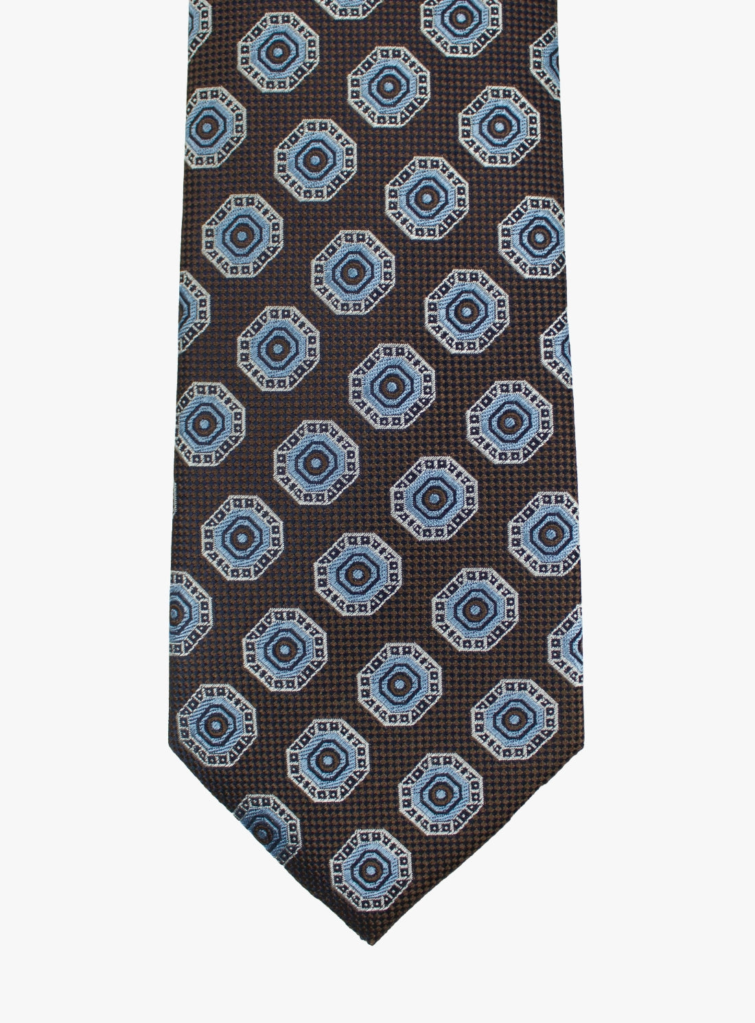 Brown tie with blue geometric pattern on a white background