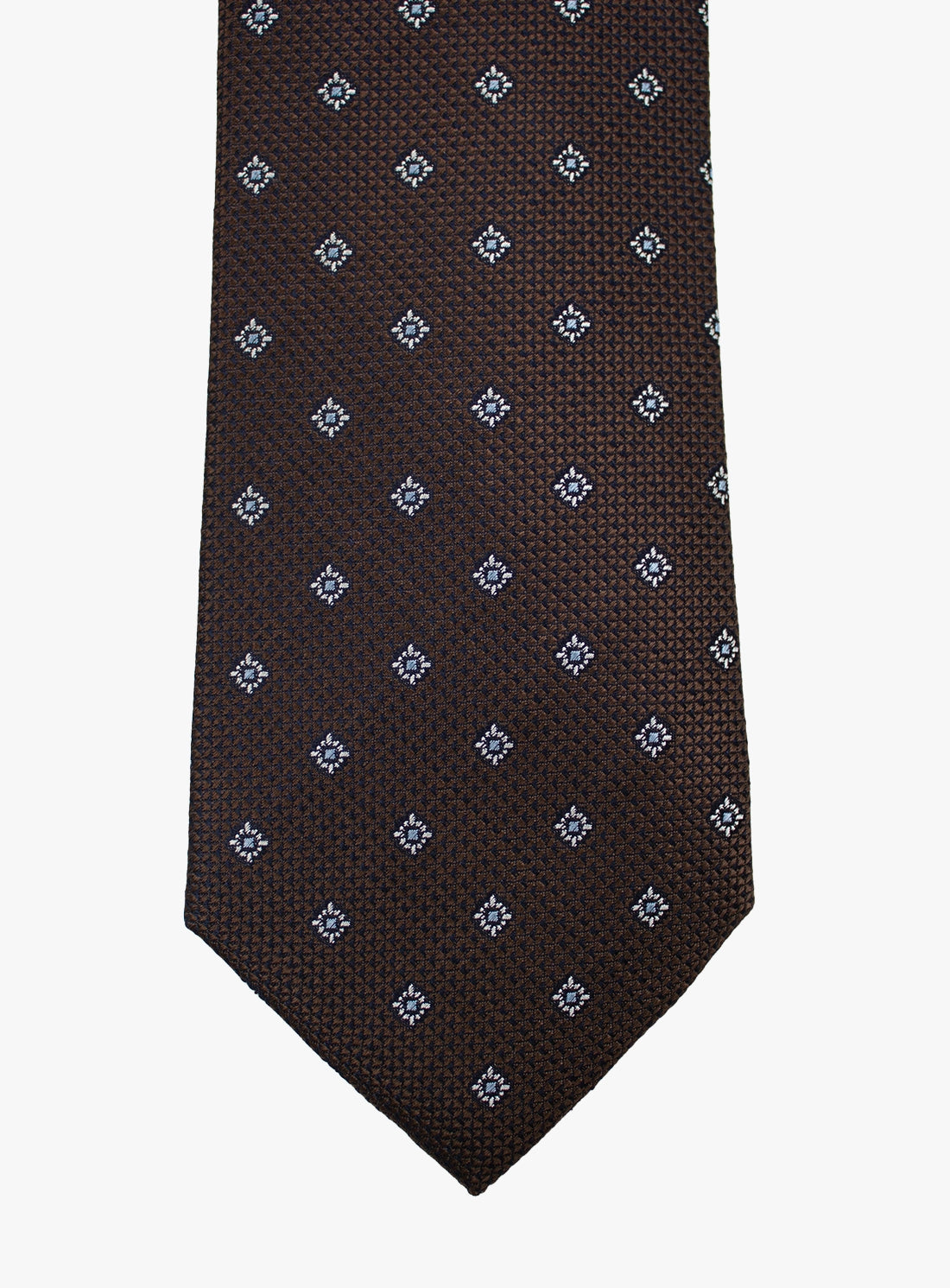 Brown tie with blue geometric pattern on a white background