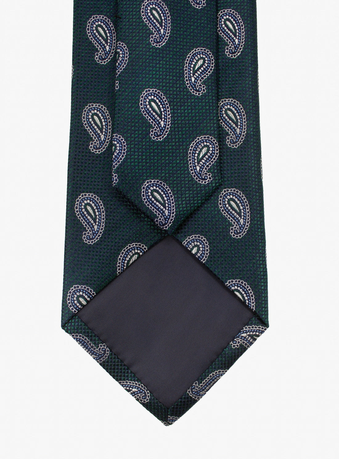 Green paisley tie with a matching pocket square on a white background