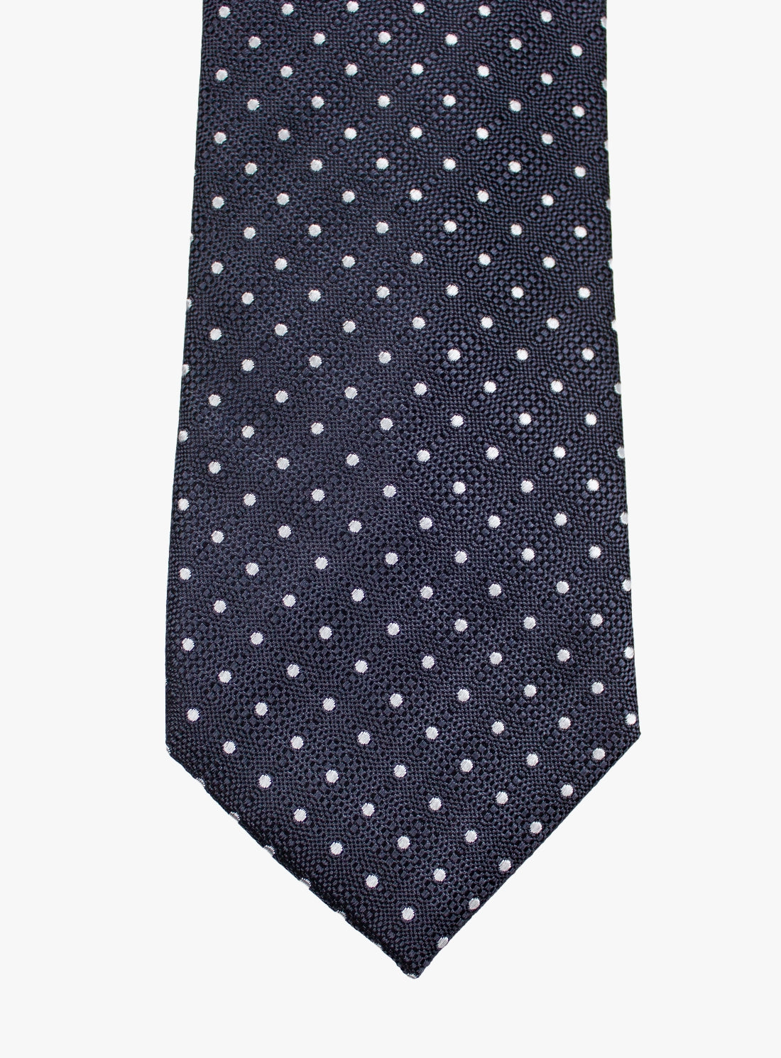 Navy blue tie with white polka dots on a white background