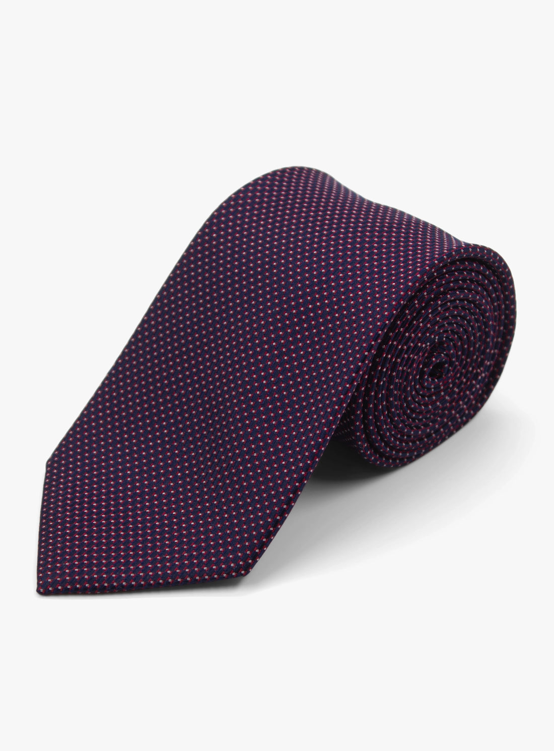 Purple patterned tie on a light gray background