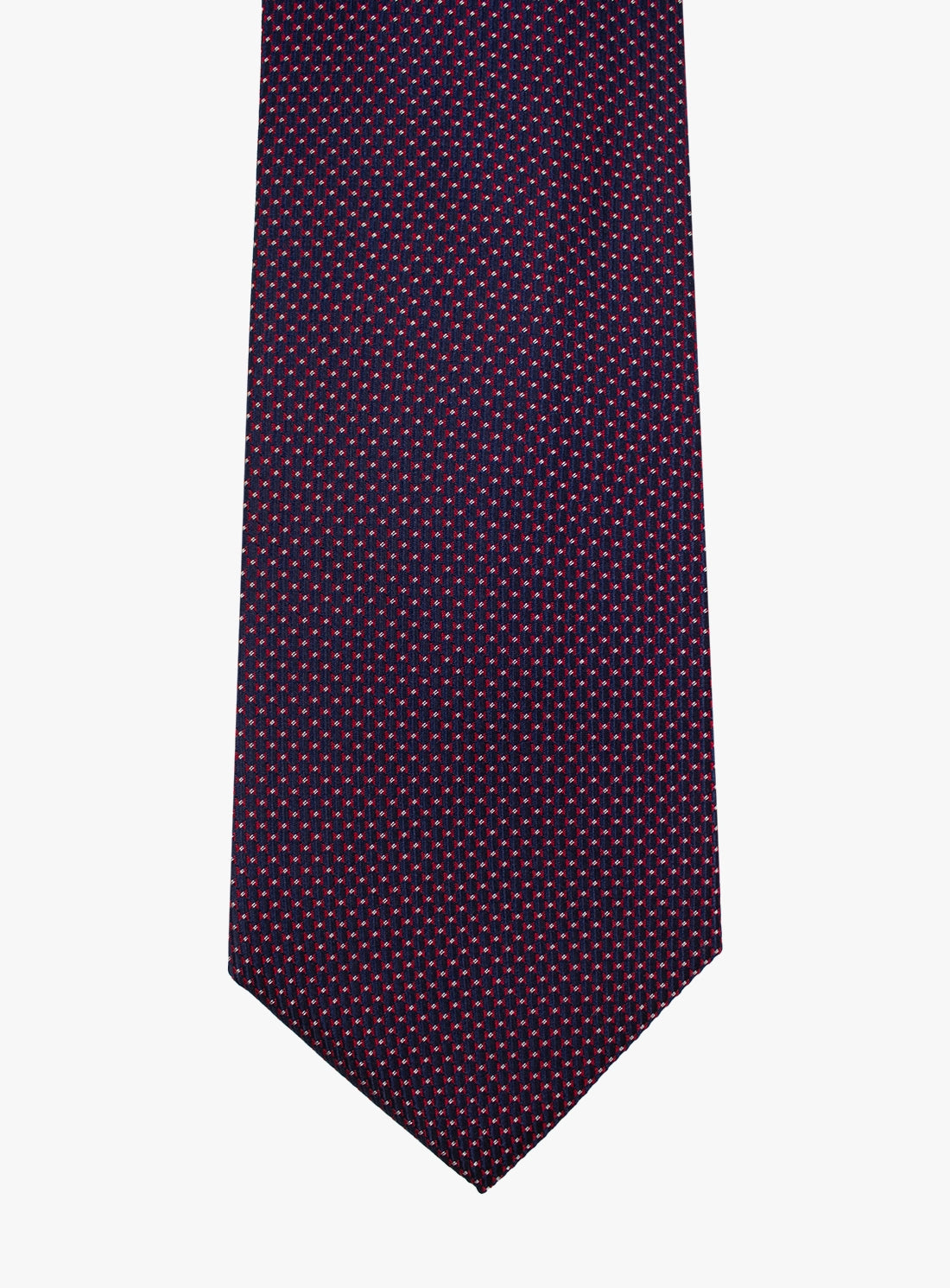 Navy blue tie with small red pattern on a white background